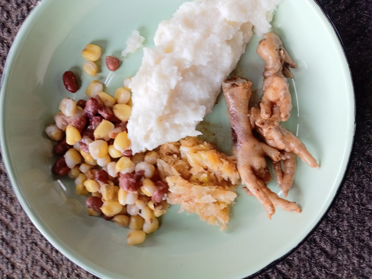 Phola community indulges in traditional meals and games